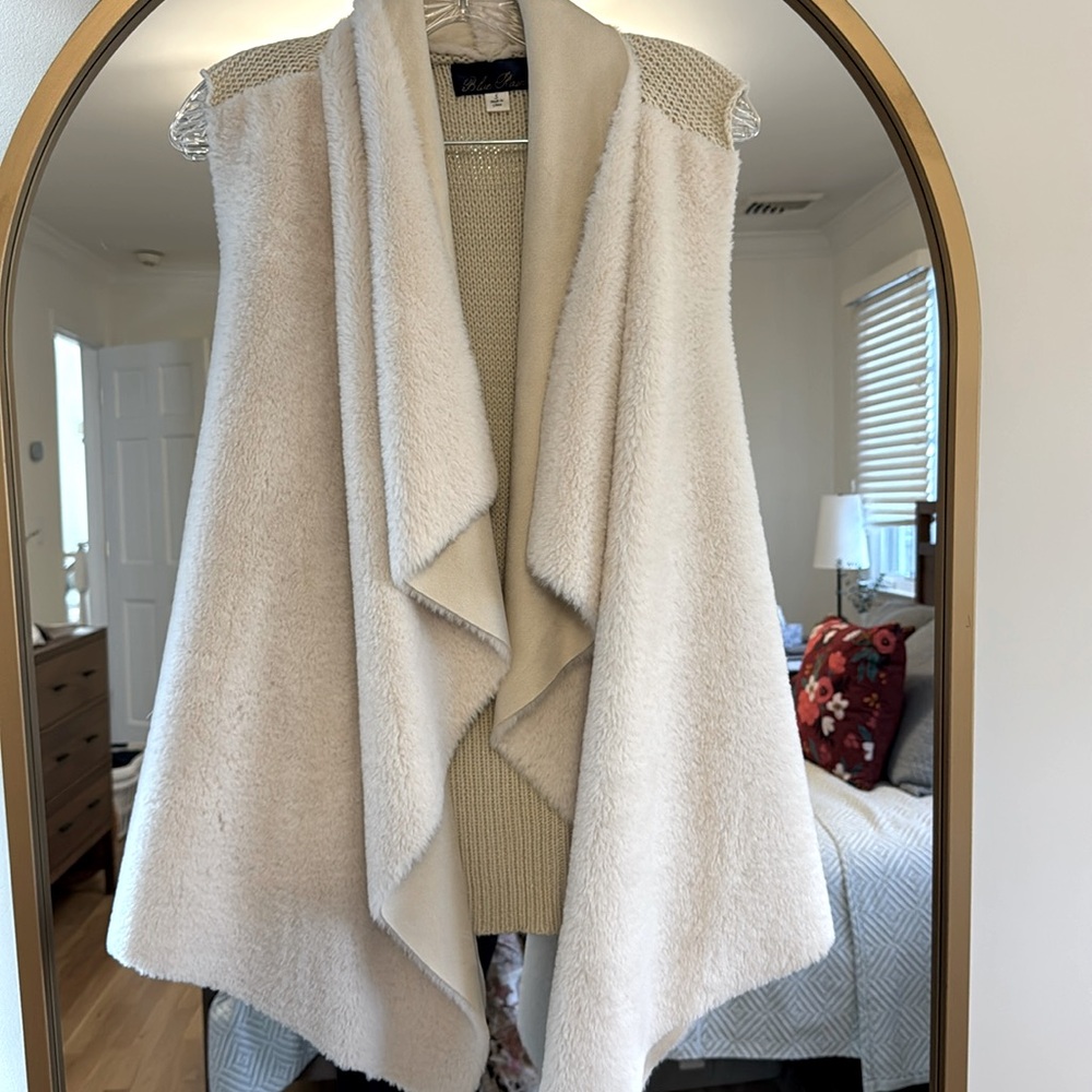 white faux fur vest